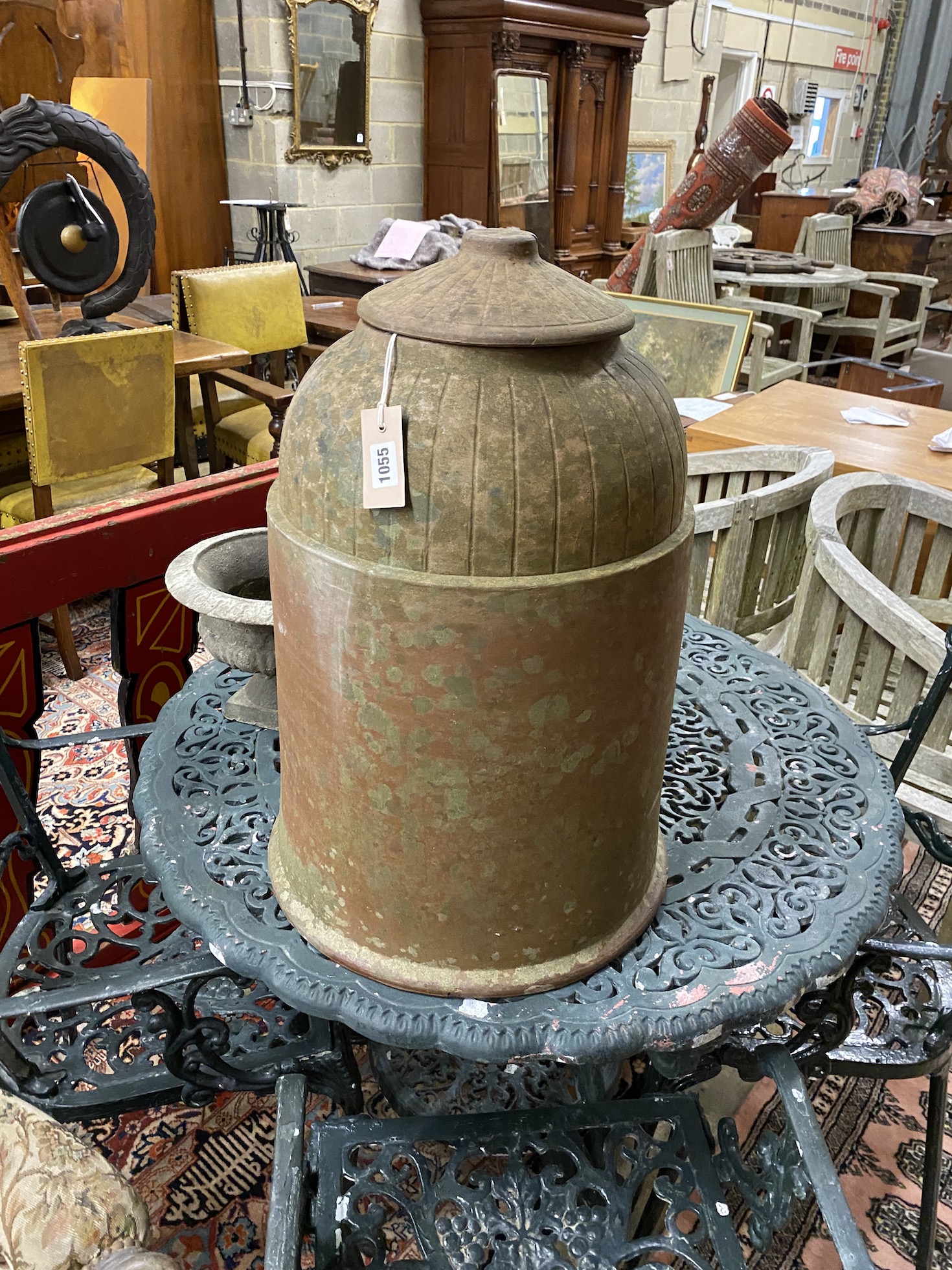 A circular terracotta rhubarb forcer with cover, height 62cm